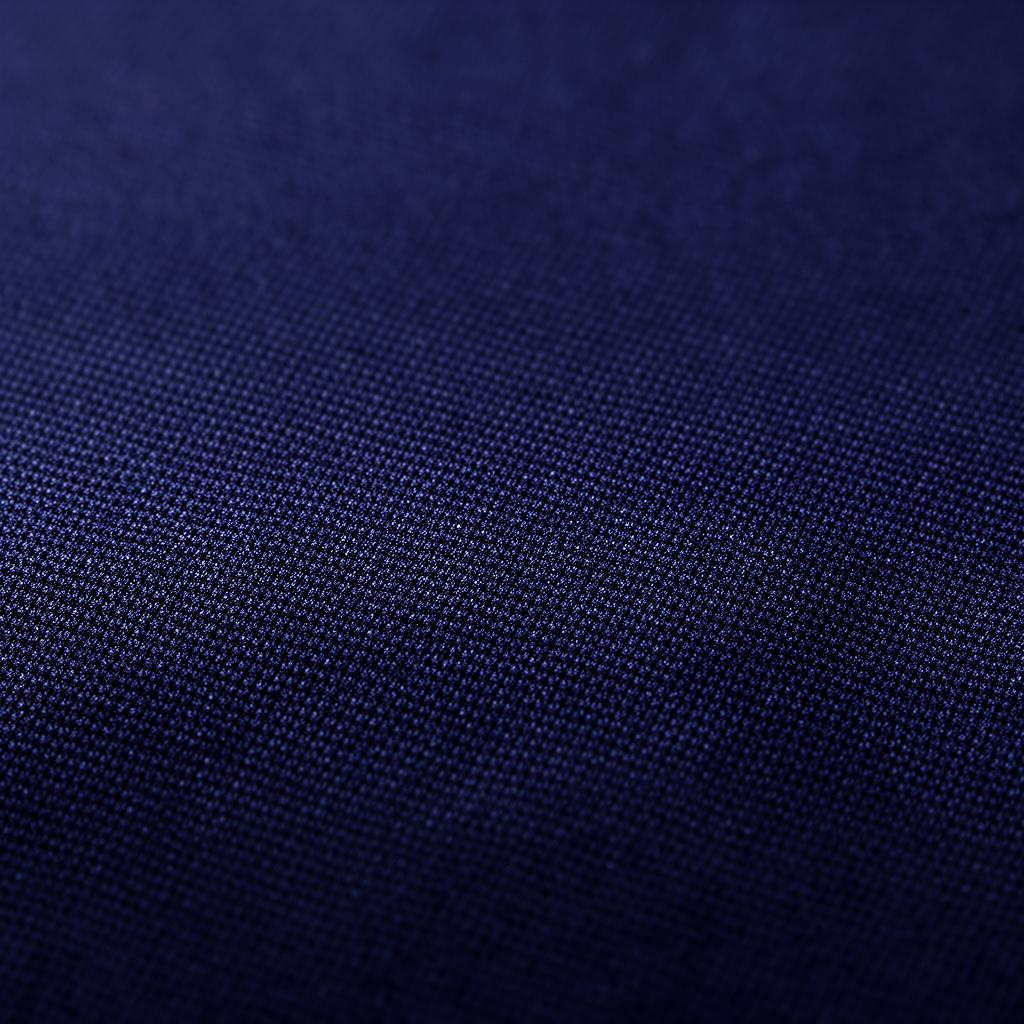 Close-up macro texture of navy blue woven fabric